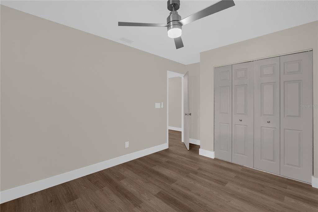 3324 Fox Ridge Drive Winter Haven, FL 33884 - Photo 24 of 28 wooden floor in an empty room