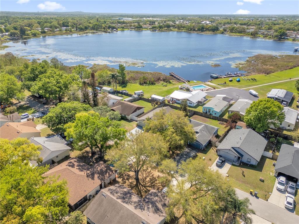 3324 Fox Ridge Drive Winter Haven, FL 33884 - Photo 3 of 28 an aerial view of lake with residential house