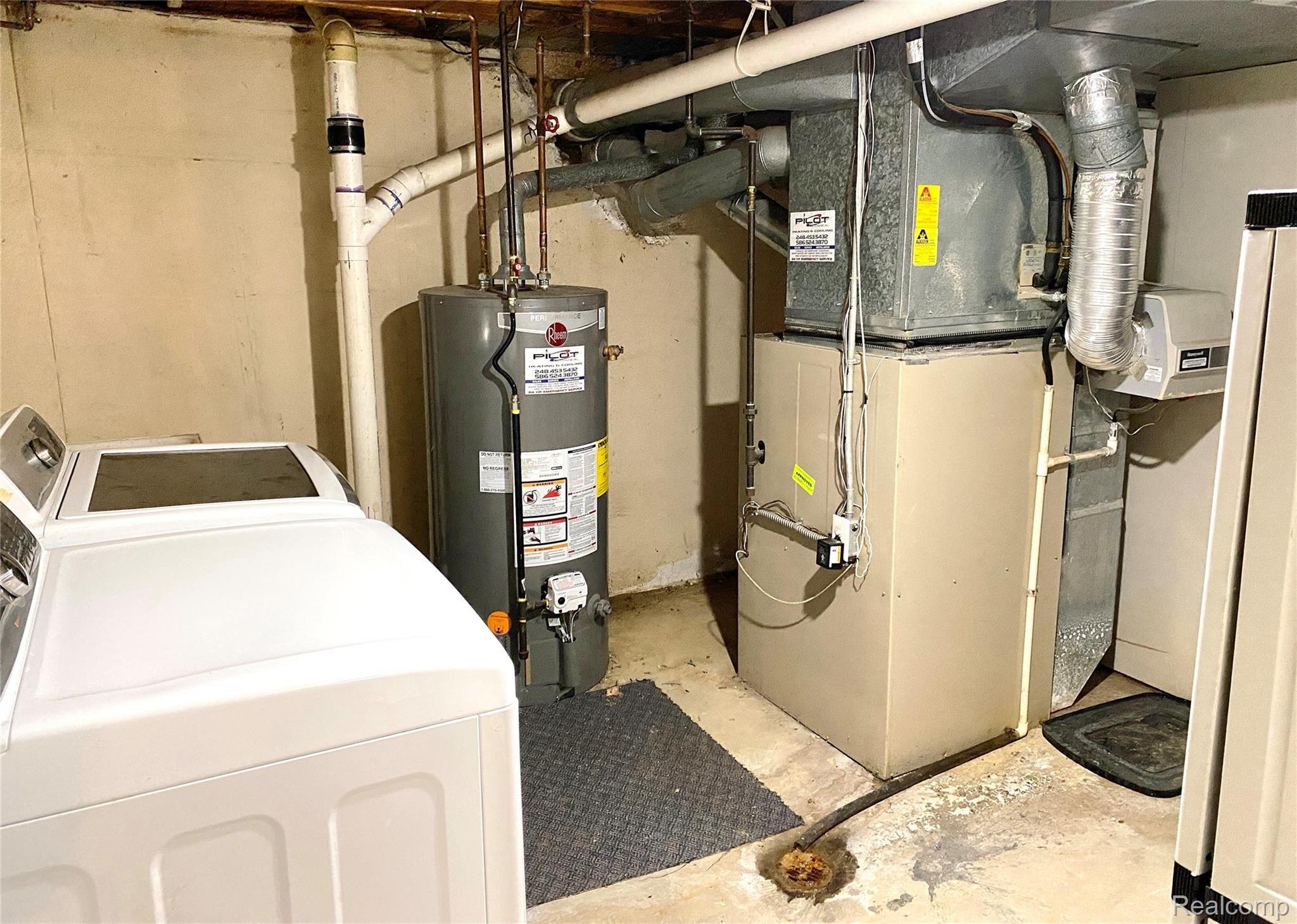1158 East Fairview Lane Rochester, MI 48306 - Photo 36 of 39 Washer and dryer, furnace water, heater.jpeg