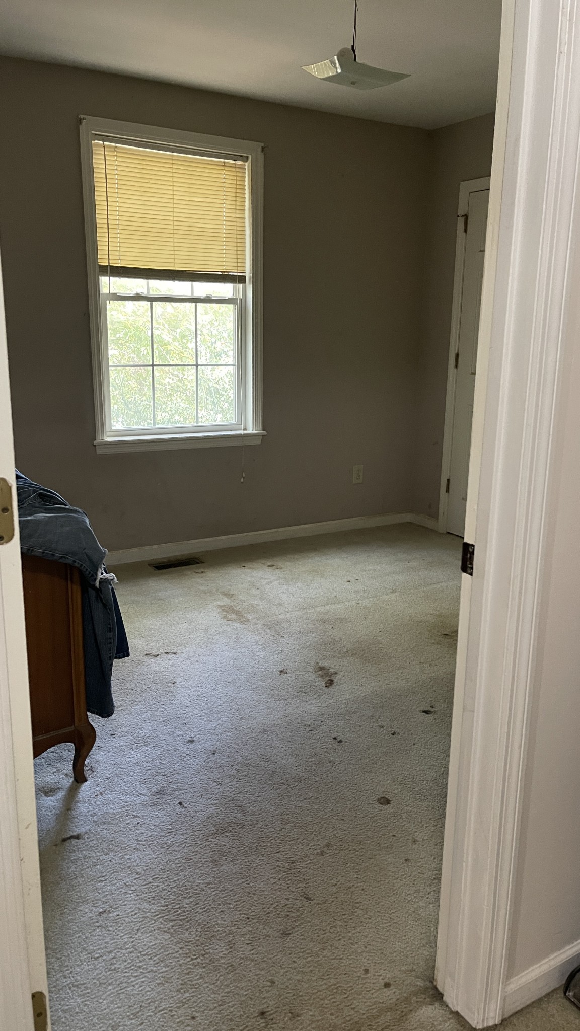 107 Sanitarium Road Madison, TN 37115 - Photo 12 of 23 a view of an empty room with a window
