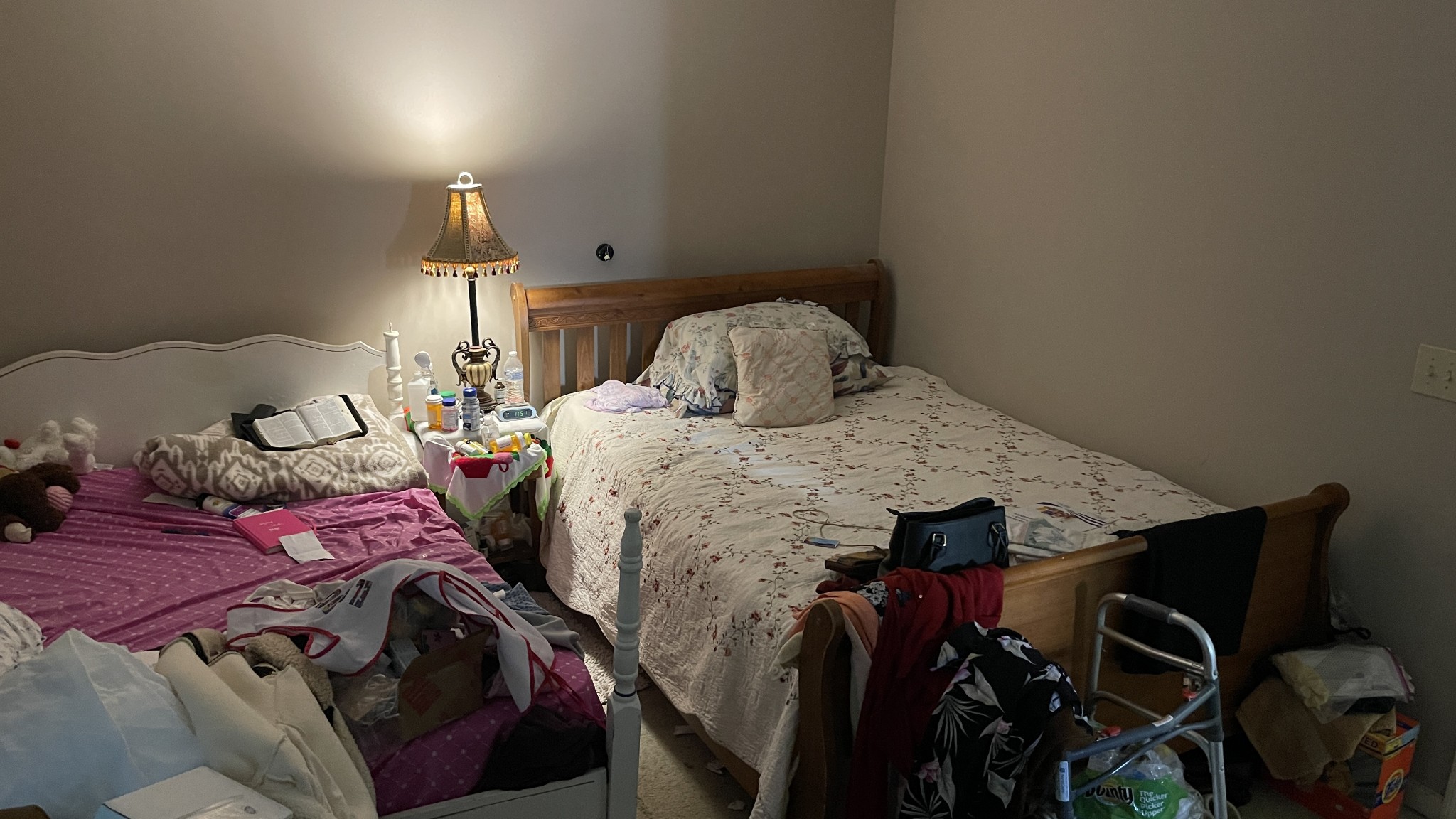107 Sanitarium Road Madison, TN 37115 - Photo 16 of 23 a bedroom with a bed and a lamp on table