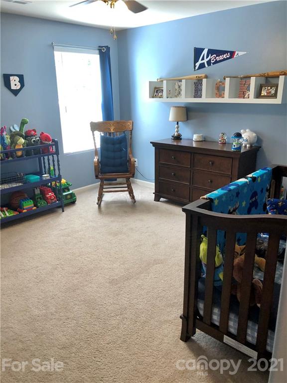 112 York Place Linwood, NC 27299 - Photo 22 of 25 a workspace with furniture and window