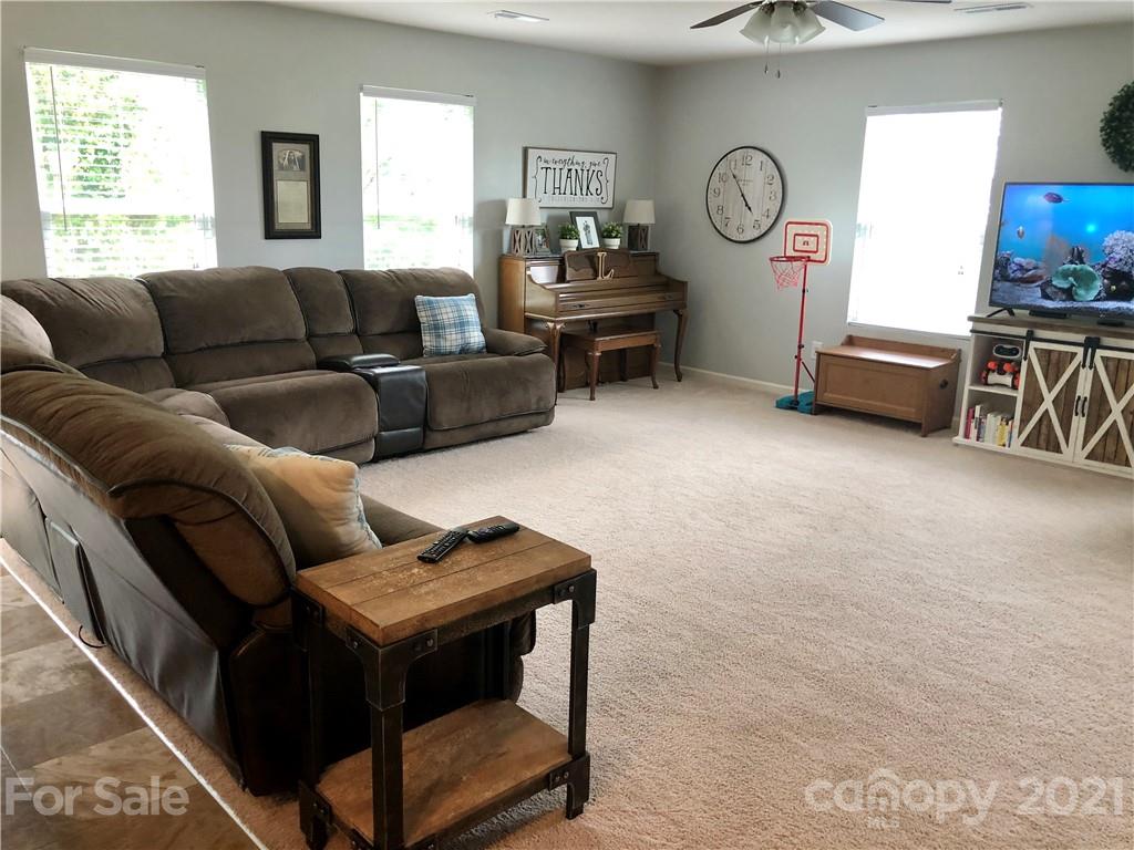112 York Place Linwood, NC 27299 - Photo 5 of 25 a living room with furniture