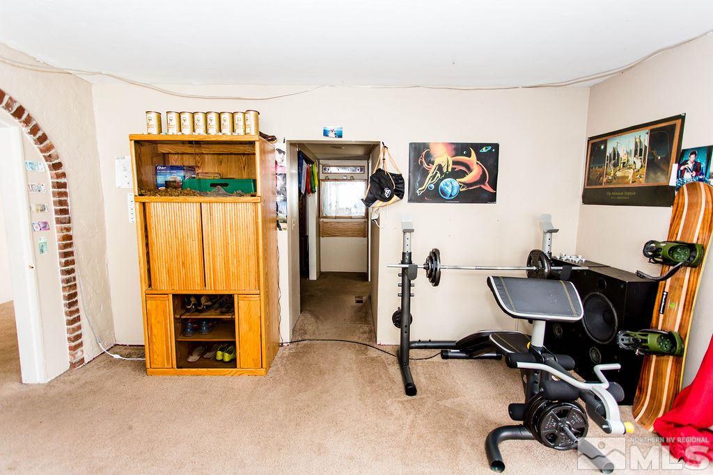 1135 Ralston Street Reno, NV 89503 - Photo 11 of 31 a view of a workspace with furniture and a window