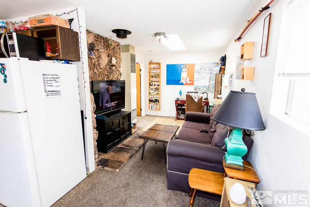 1135 Ralston Street Reno, NV 89503 - Photo 17 of 31 a living room with furniture and a flat screen tv