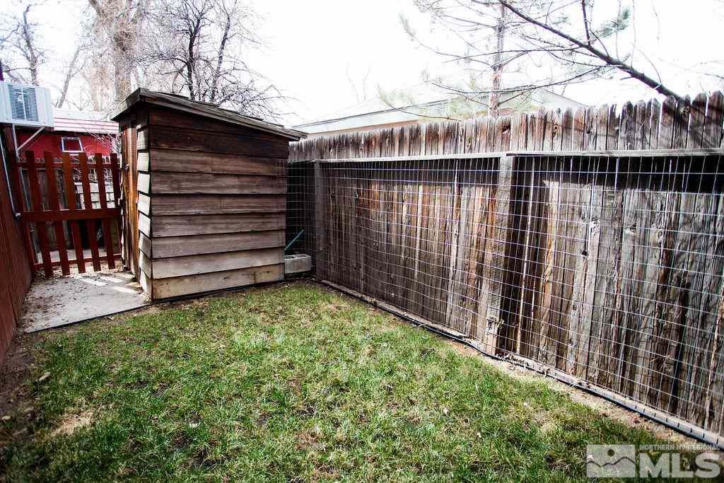 1135 Ralston Street Reno, NV 89503 - Photo 31 of 31 a view of a house with a wooden fence