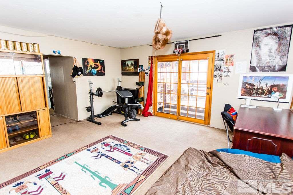 1135 Ralston Street Reno, NV 89503 - Photo 10 of 31 a bed room with a bed furniture and a window