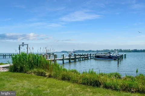 a view of a lake with green space