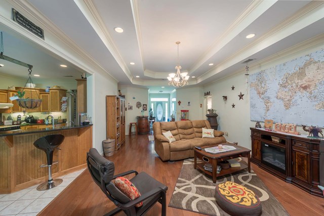 2121 Lee Road Salem, AL 36874 - Photo 3 of 29 a living room with furniture a rug and a fireplace