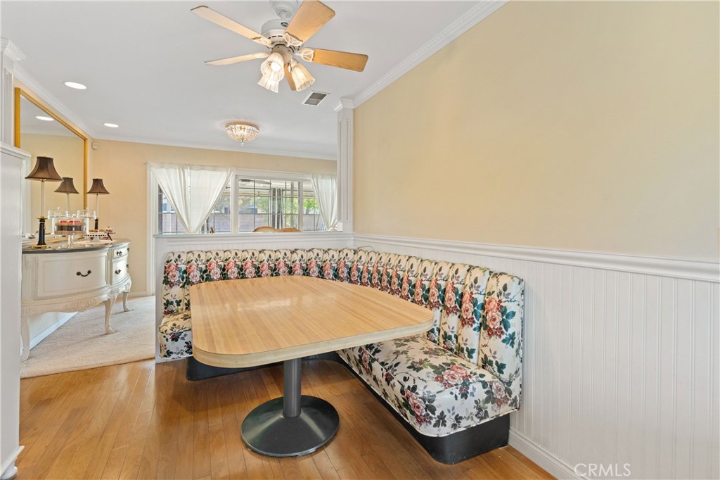 3008 Cisco Court Simi Valley, CA 93063 - Photo 16 of 34 Breakfast area, open to the dining area, with built-in custom seating & a ceiling fan