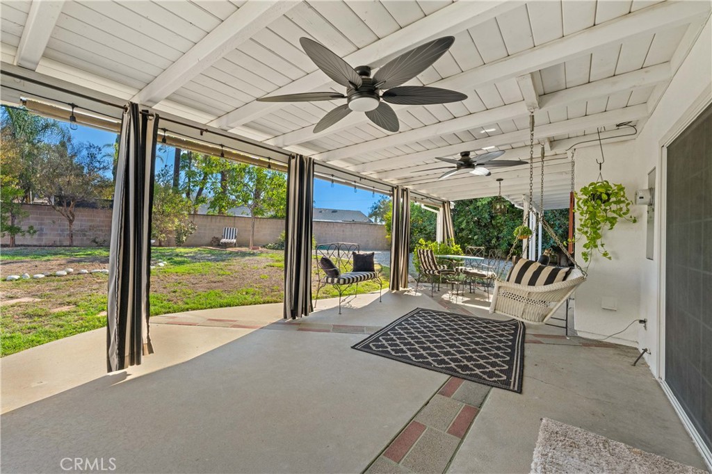 3008 Cisco Court Simi Valley, CA 93063 - Photo 2 of 34 Great covered patio with 2 ceiling fans, lighting & shades. Great for al fresco dining.