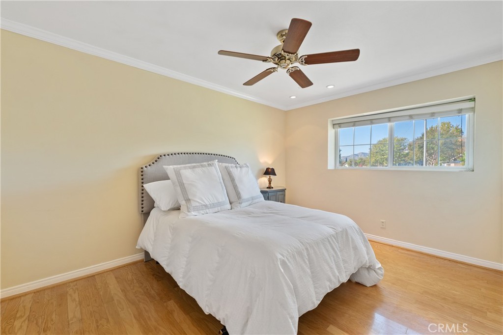 3008 Cisco Court Simi Valley, CA 93063 - Photo 21 of 34 Bedroom #2 with wood floor, view of the mountains & a ceiling fan