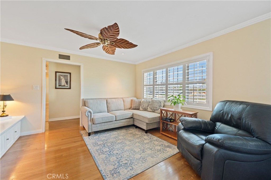 3008 Cisco Court Simi Valley, CA 93063 - Photo 7 of 34 Family room with view of the mountains, wood floor & a ceiling fan
