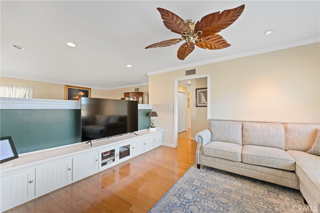 3008 Cisco Court Simi Valley, CA 93063 - Photo 8 of 34 Family room with custom cabinets, crown molding & recessed lighting