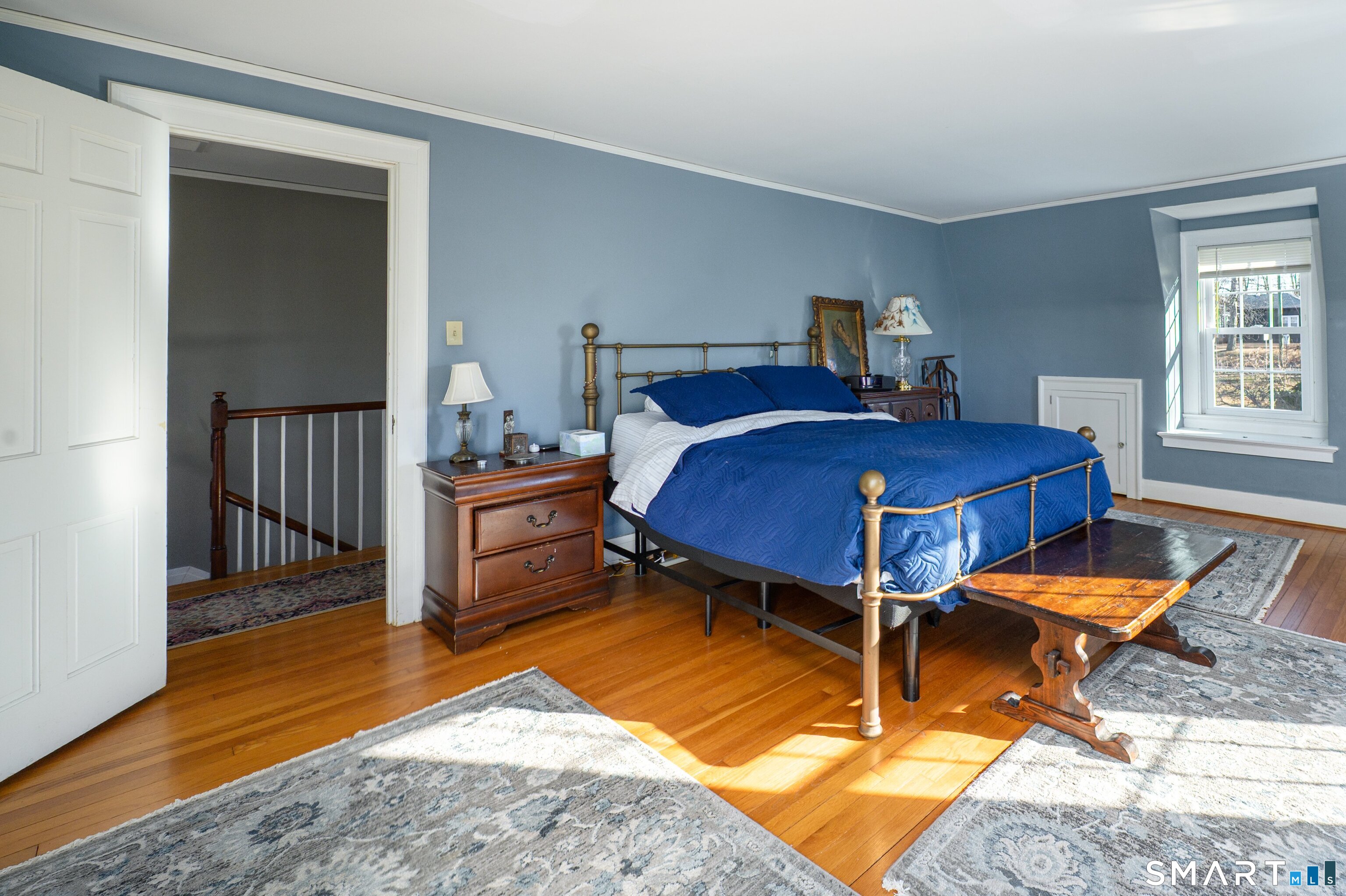 570 North Main Street Wallingford, CT 06492 - Photo 24 of 40 a bedroom with a bed and a window in it