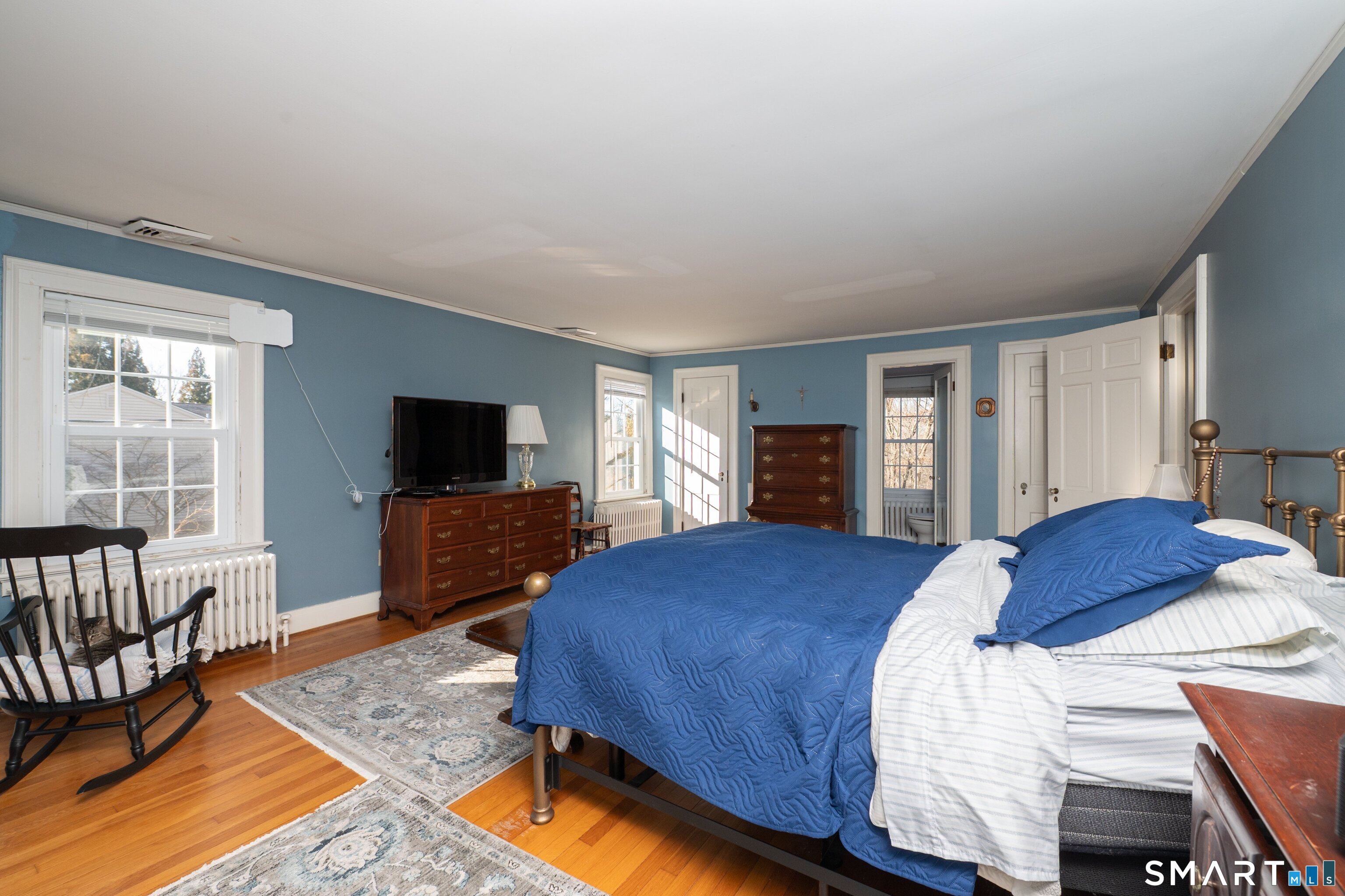 570 North Main Street Wallingford, CT 06492 - Photo 26 of 40 a bedroom with a bed and a television