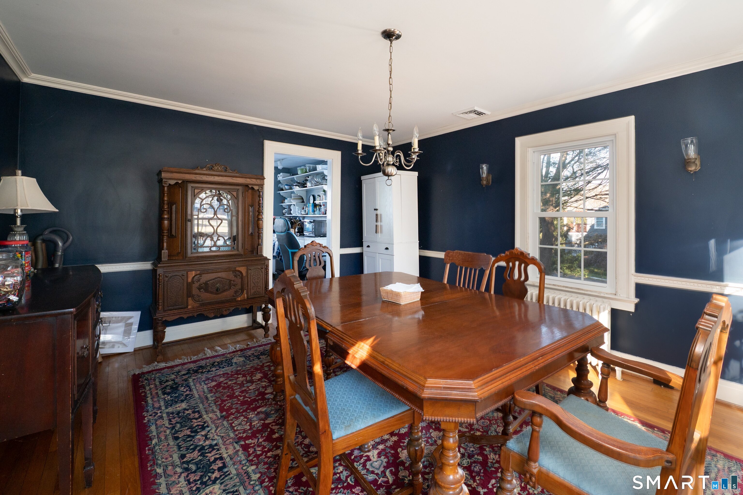 570 North Main Street Wallingford, CT 06492 - Photo 3 of 40 a dining room with furniture window and wooden floor