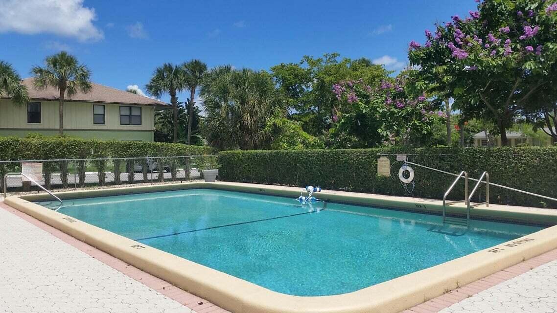 55 Southwest 2nd Avenue, Unit 509 Boca Raton, FL 33432 - Photo 17 of 20 a view of a swimming pool with a patio