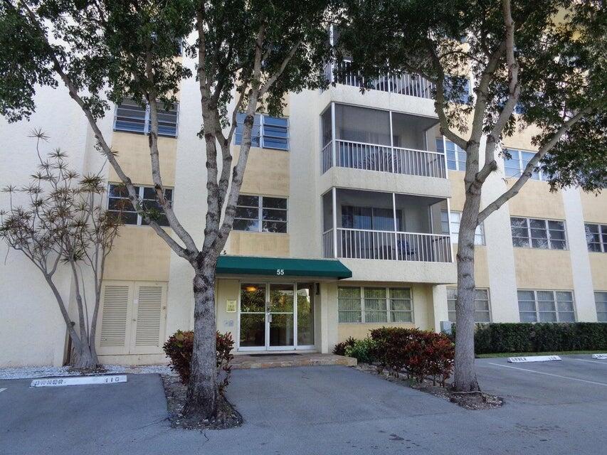 55 Southwest 2nd Avenue, Unit 509 Boca Raton, FL 33432 - Photo 2 of 20 a front view of a building with garden
