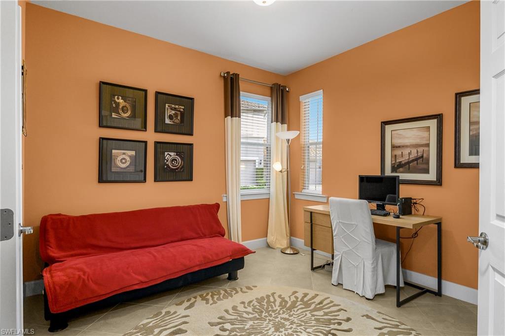 9064 Siesta Bay Drive, Unit 5102 Naples, FL 34120 - Photo 22 of 46 Den/Office space with french doors is located near the entry to the home and is versatile and large enough for an office and/or a pull out couch for additional guests. Add a closet and it makes the perfect 3rd bedroom.