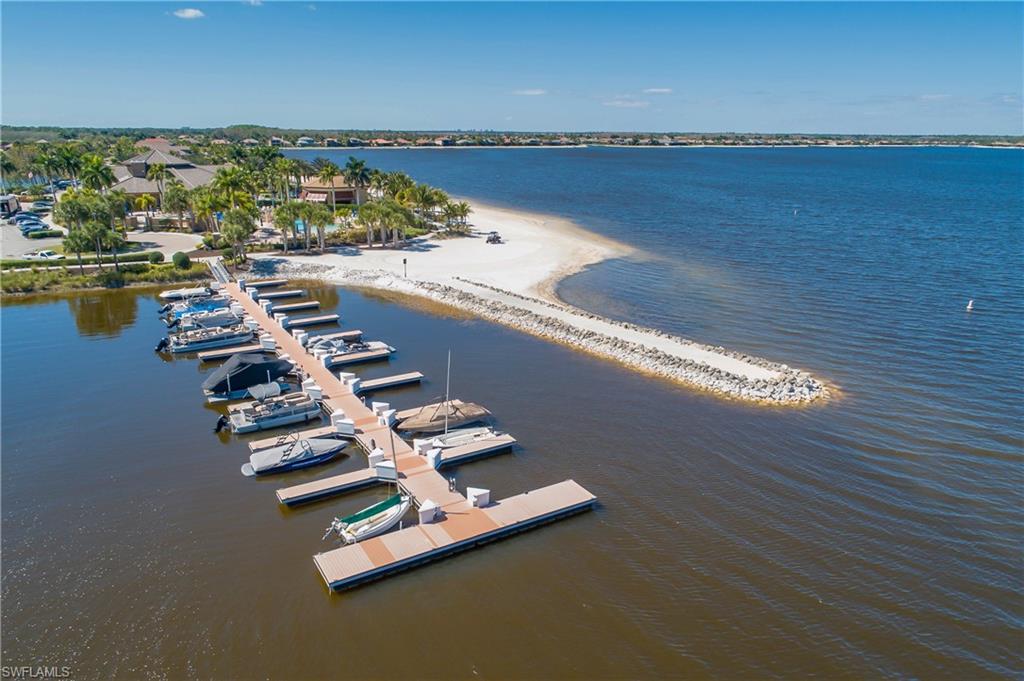 9064 Siesta Bay Drive, Unit 5102 Naples, FL 34120 - Photo 42 of 46 If you love boating or fishing, you can lease a dock and enjoy the freshwater lakes within the community.