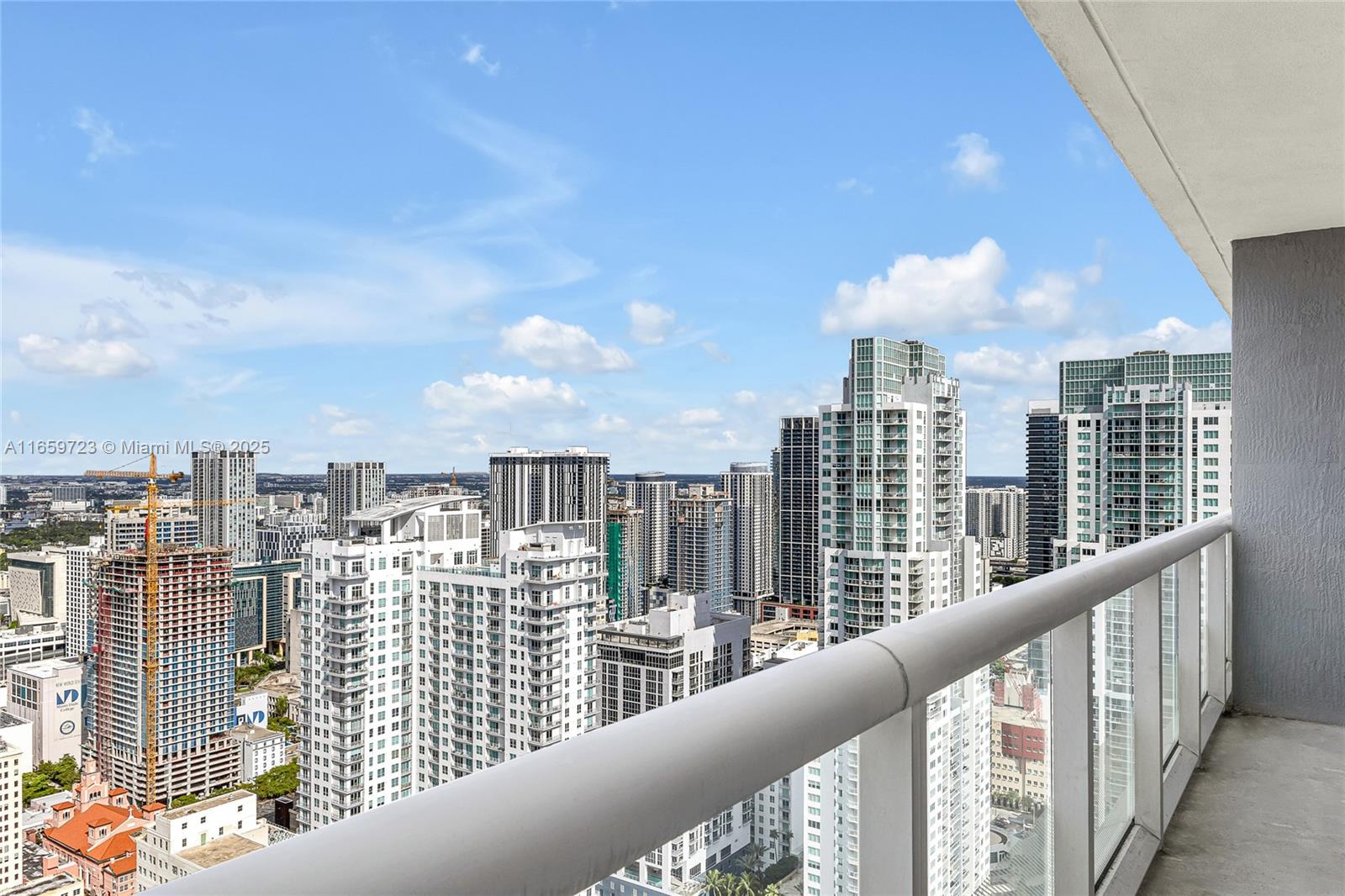 50 Biscayne Boulevard, Unit 4809 Miami, FL 33132 - Photo 2 of 11 a view of city from a balcony