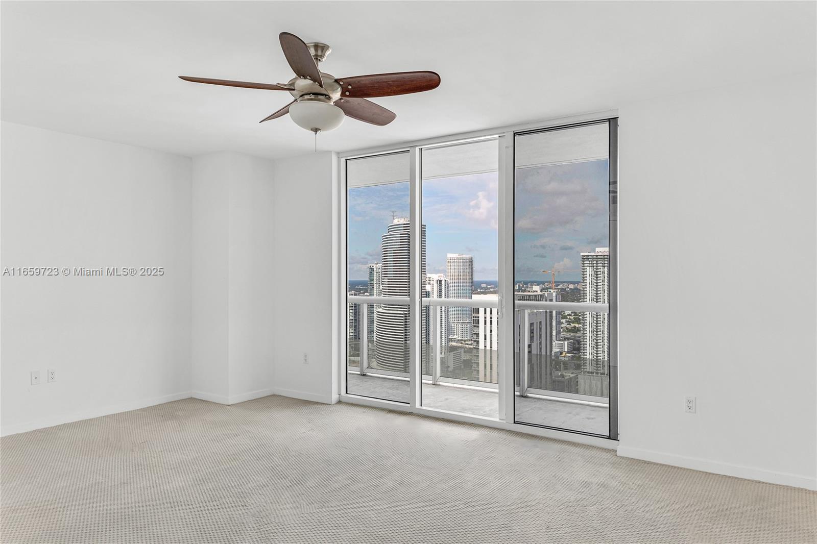 50 Biscayne Boulevard, Unit 4809 Miami, FL 33132 - Photo 5 of 11 a view of a room with stairs