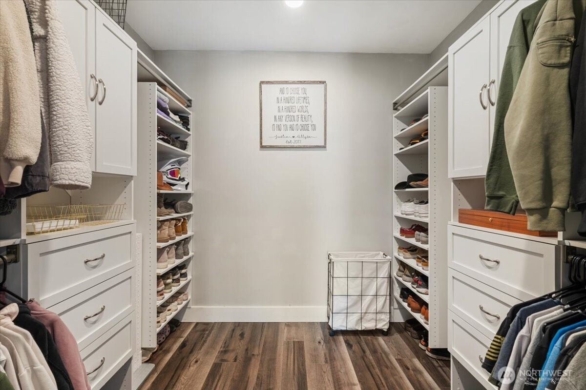 26709 Entwhistle Road East Buckley, WA 98321 - Photo 23 of 40 a view of walk in closet with clothes and shoes