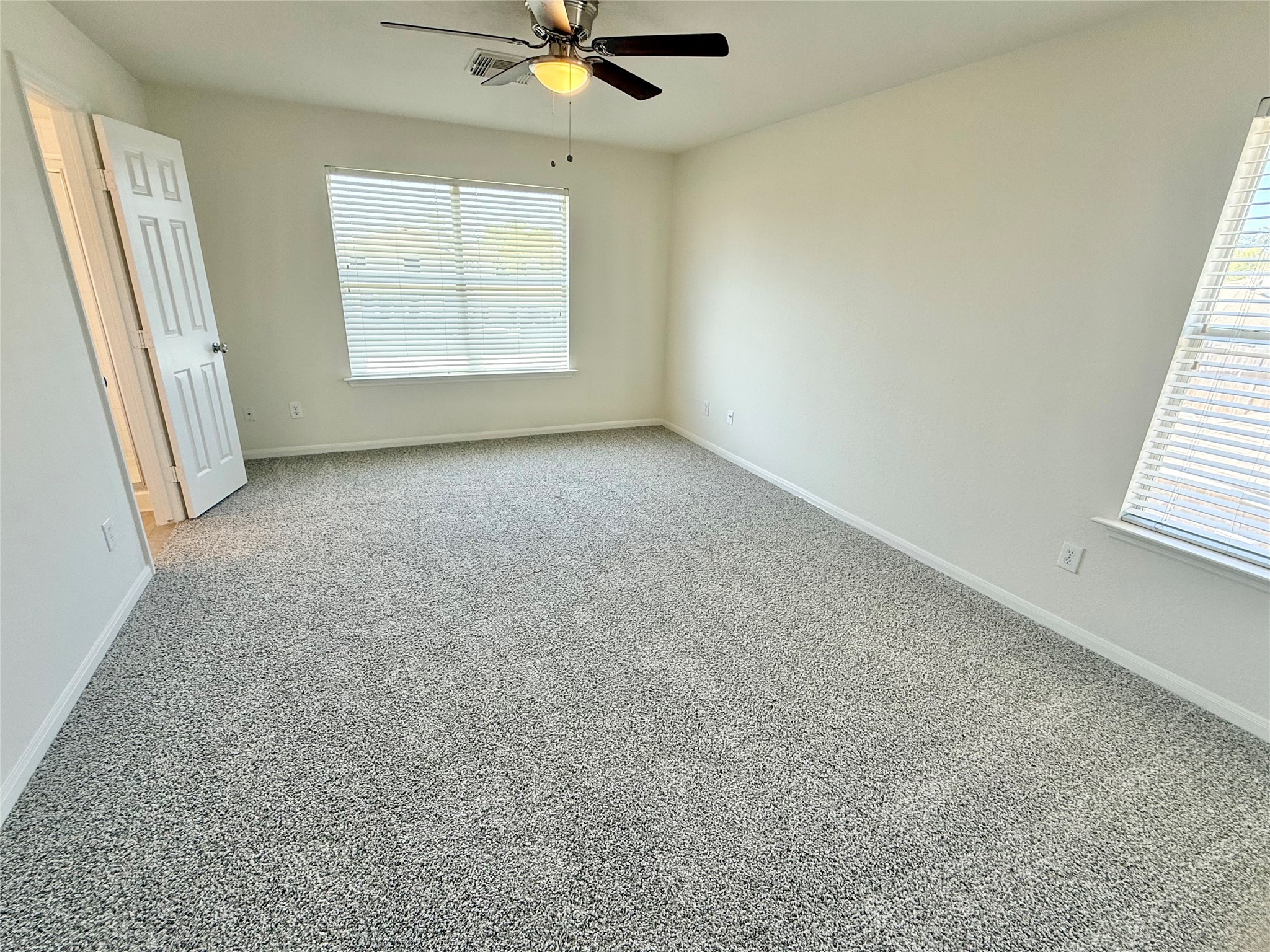 3430 Falcon Trail Court Spring, TX 77373 - Photo 21 of 31 Walk upstairs to the primary bedroom with an en-suite bathroom and walk-in closet.