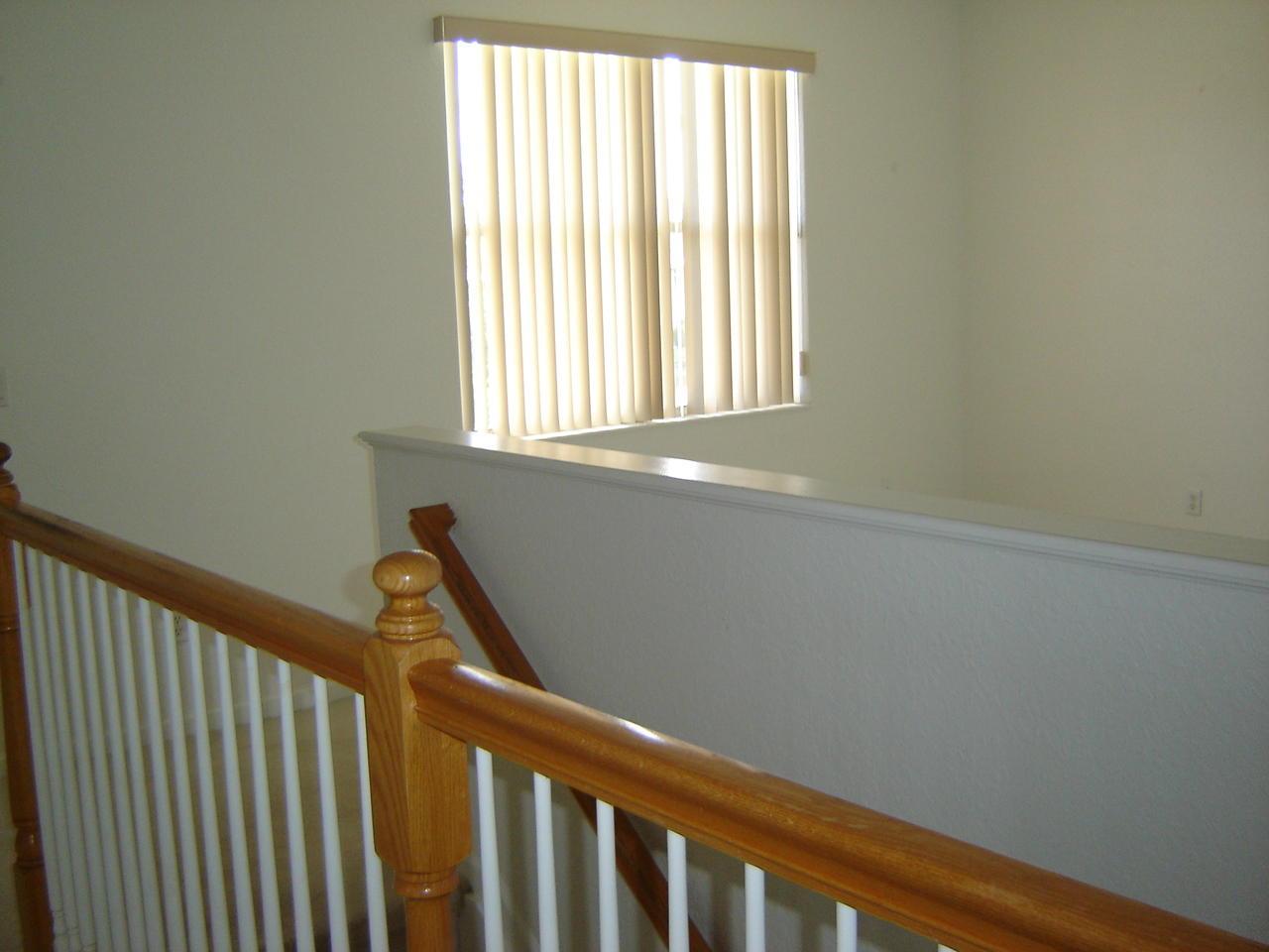 250 Southwest Walking Path Stuart, FL 34997 - Photo 12 of 19 Stairwell to loft