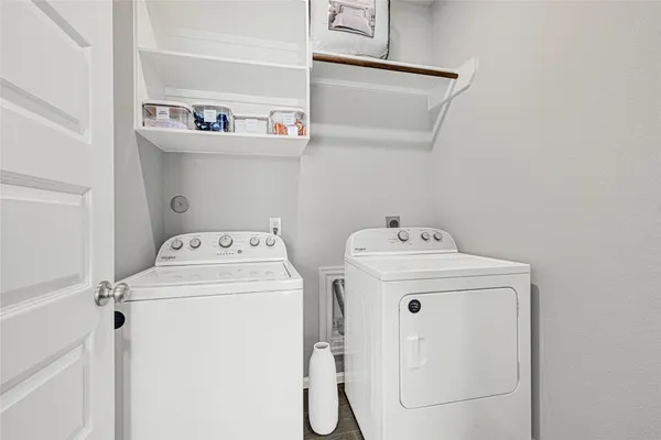 a utility room with dryer and washer