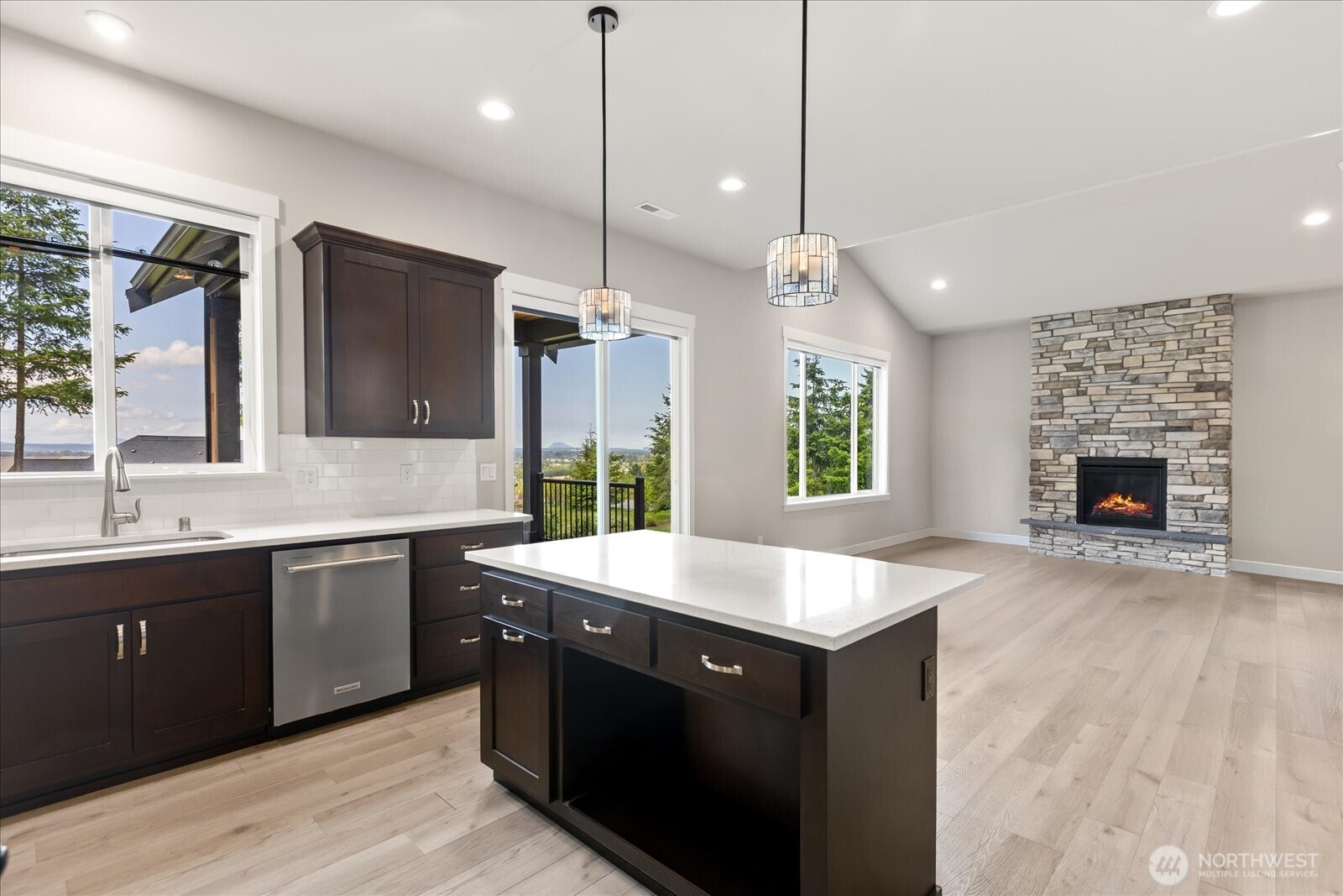 20434 Benson Ridge Mount Vernon, WA 98274 - Photo 12 of 31 a large kitchen with kitchen island a sink stainless steel appliances and a counter top