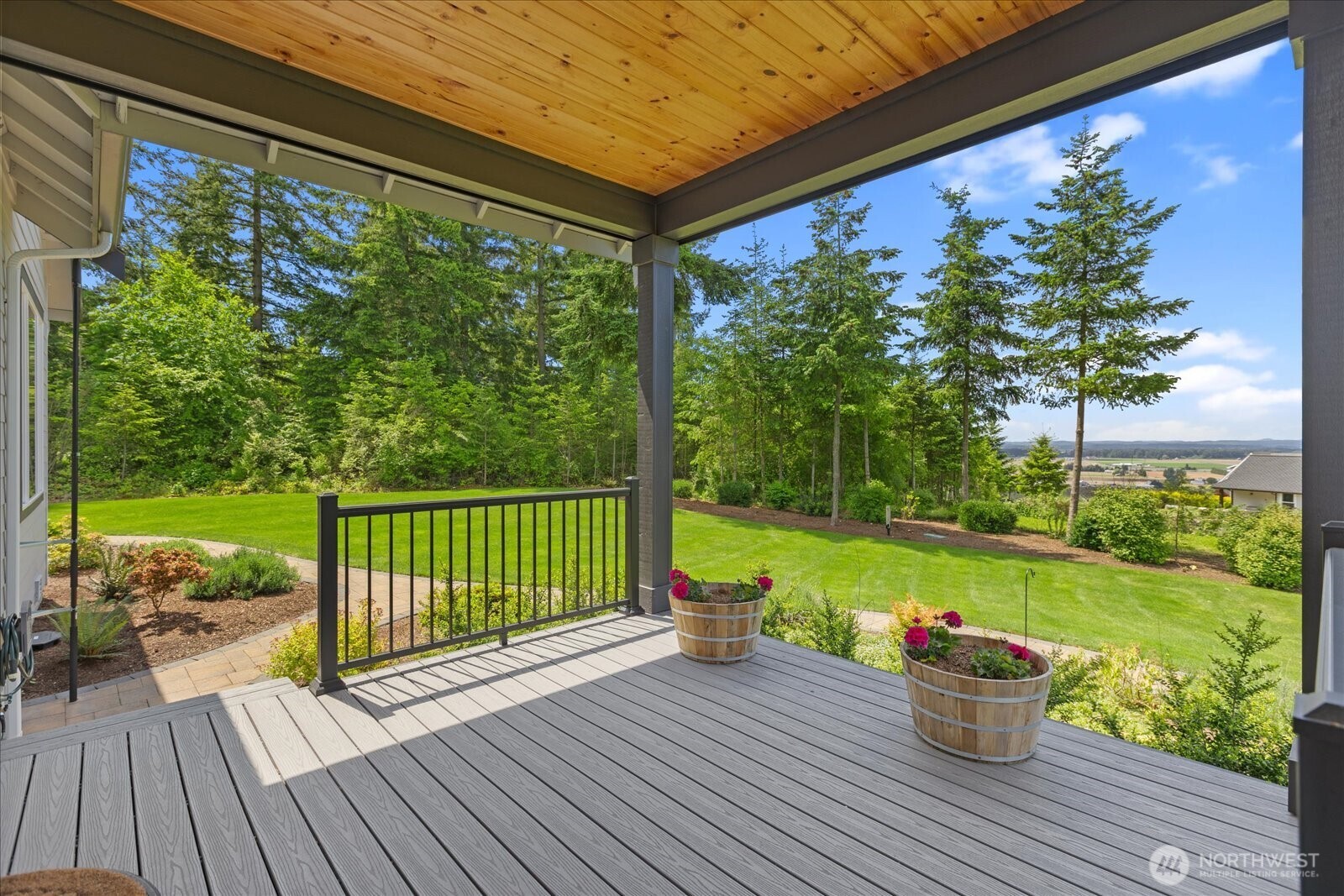 20434 Benson Ridge Mount Vernon, WA 98274 - Photo 20 of 31 a view of a deck with chair and floor to ceiling window