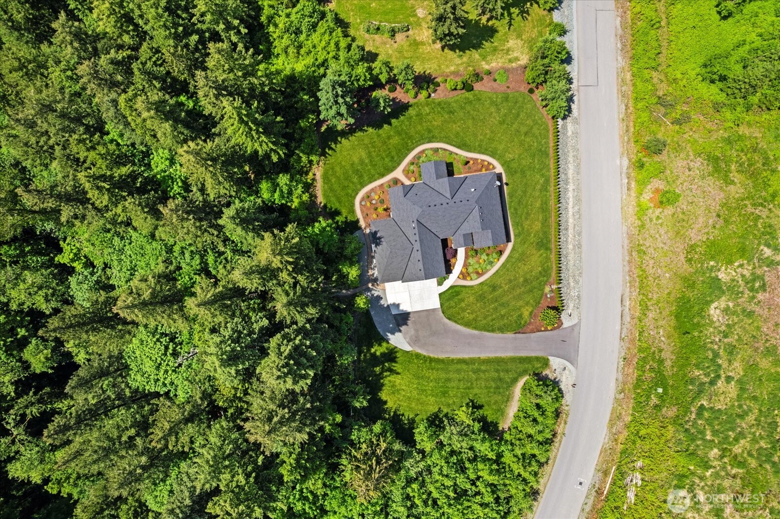 20434 Benson Ridge Mount Vernon, WA 98274 - Photo 25 of 31 an aerial view of a house with a swimming pool