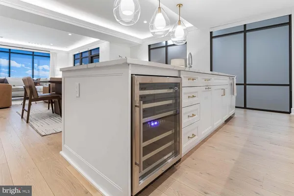 a stove top oven sitting inside of a kitchen