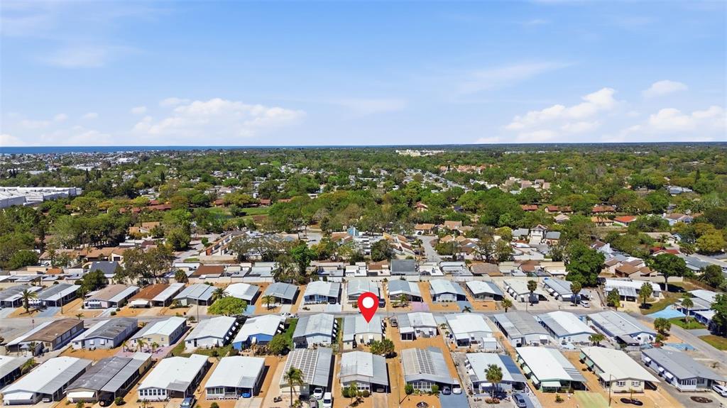 7402 Cascade Drive Hudson, FL 34667 - Photo 31 of 31 an aerial view of residential houses with city view