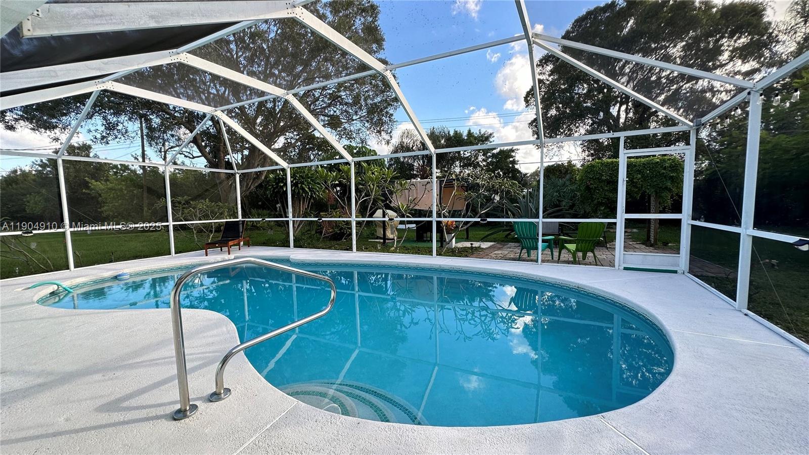 a view of a swimming pool with a porch