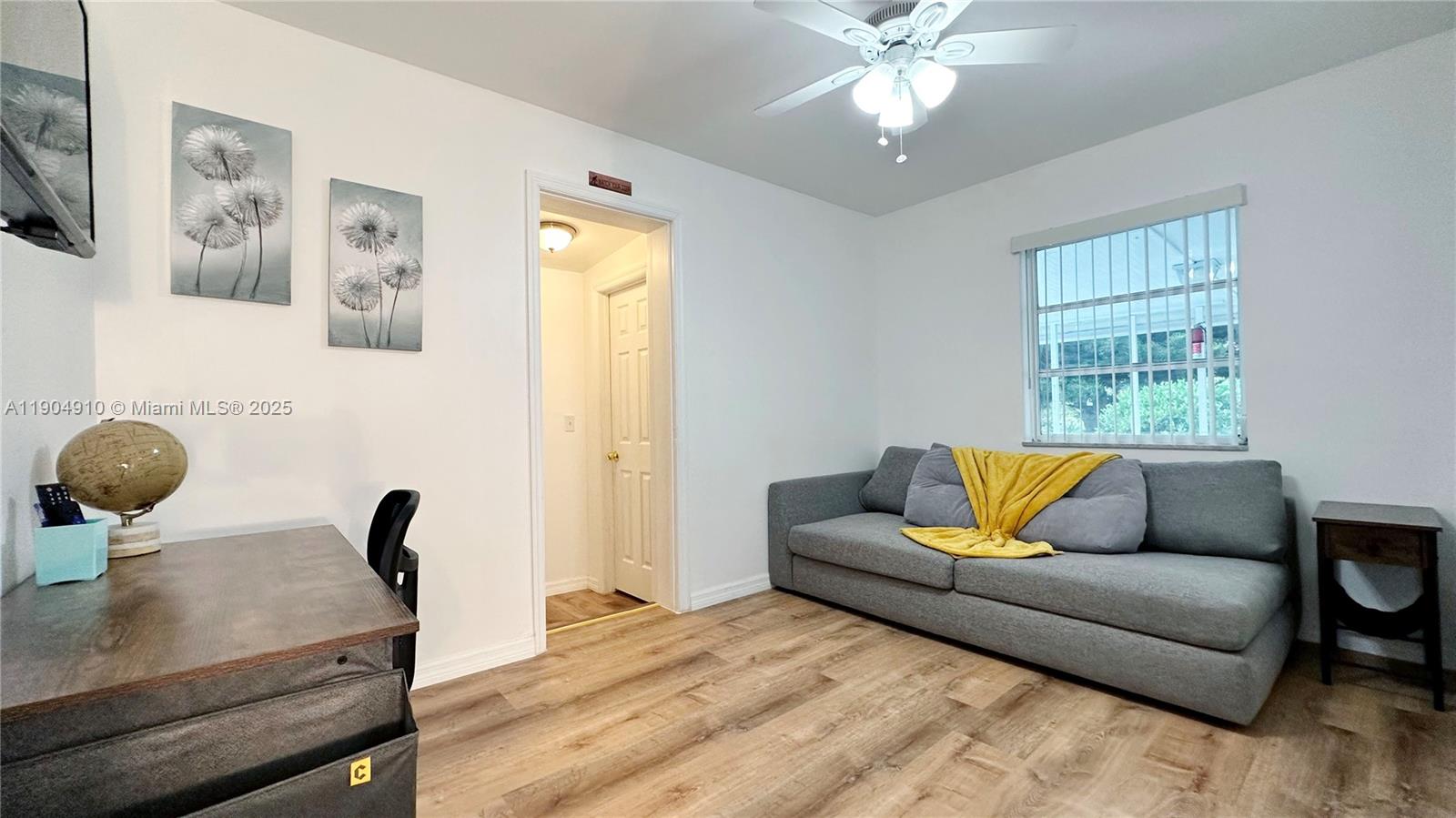 210 Banyan Drive Port St. Lucie, FL 34952 - Photo 15 of 22 a living room with furniture and a window