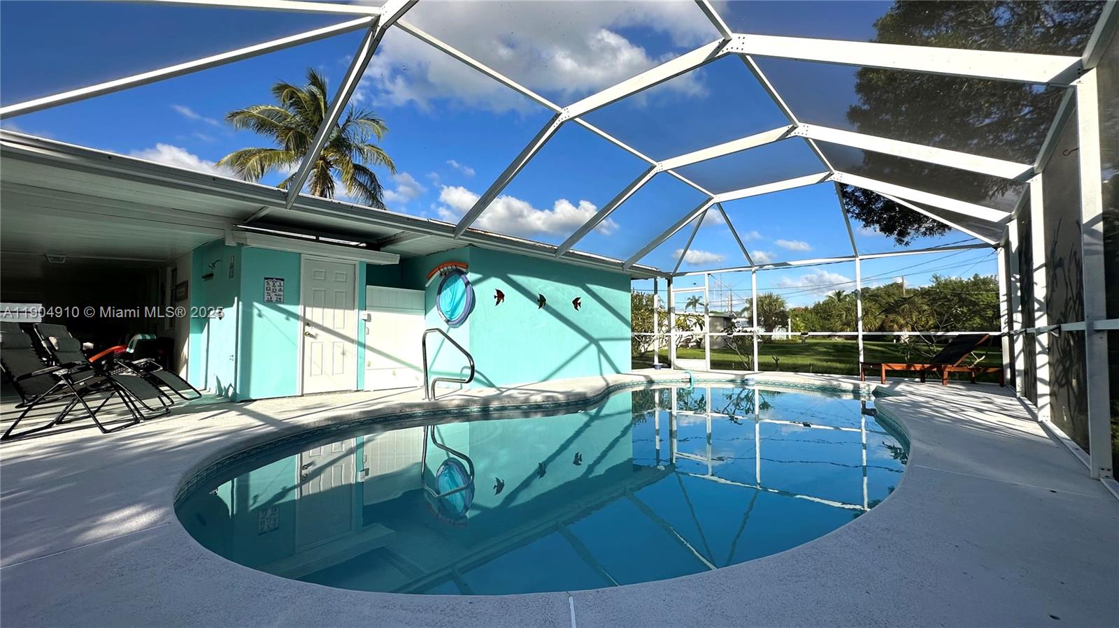 210 Banyan Drive Port St. Lucie, FL 34952 - Photo 22 of 22 a view of a couches with wooden floor