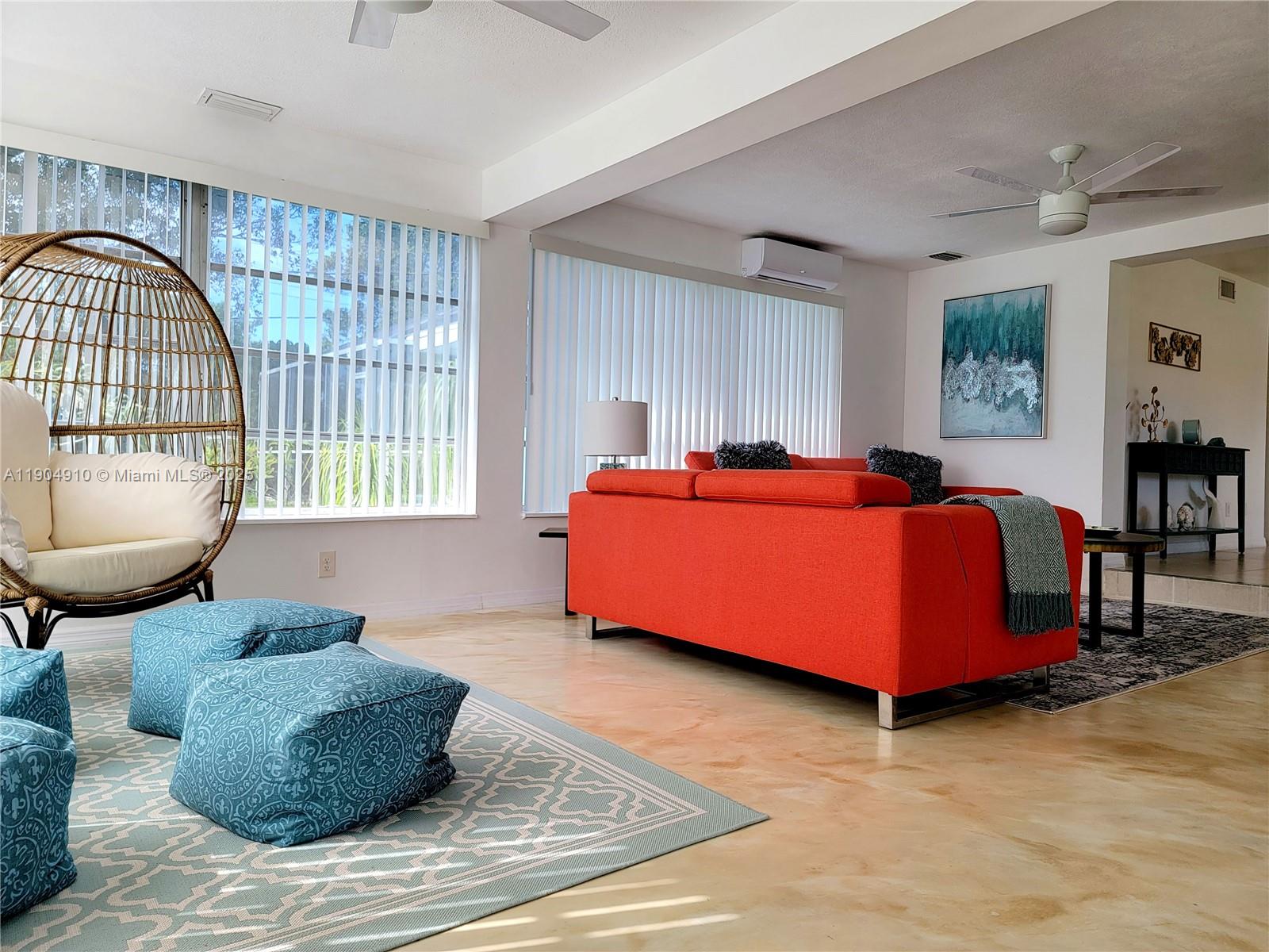 210 Banyan Drive Port St. Lucie, FL 34952 - Photo 9 of 22 a bedroom with furniture and a window