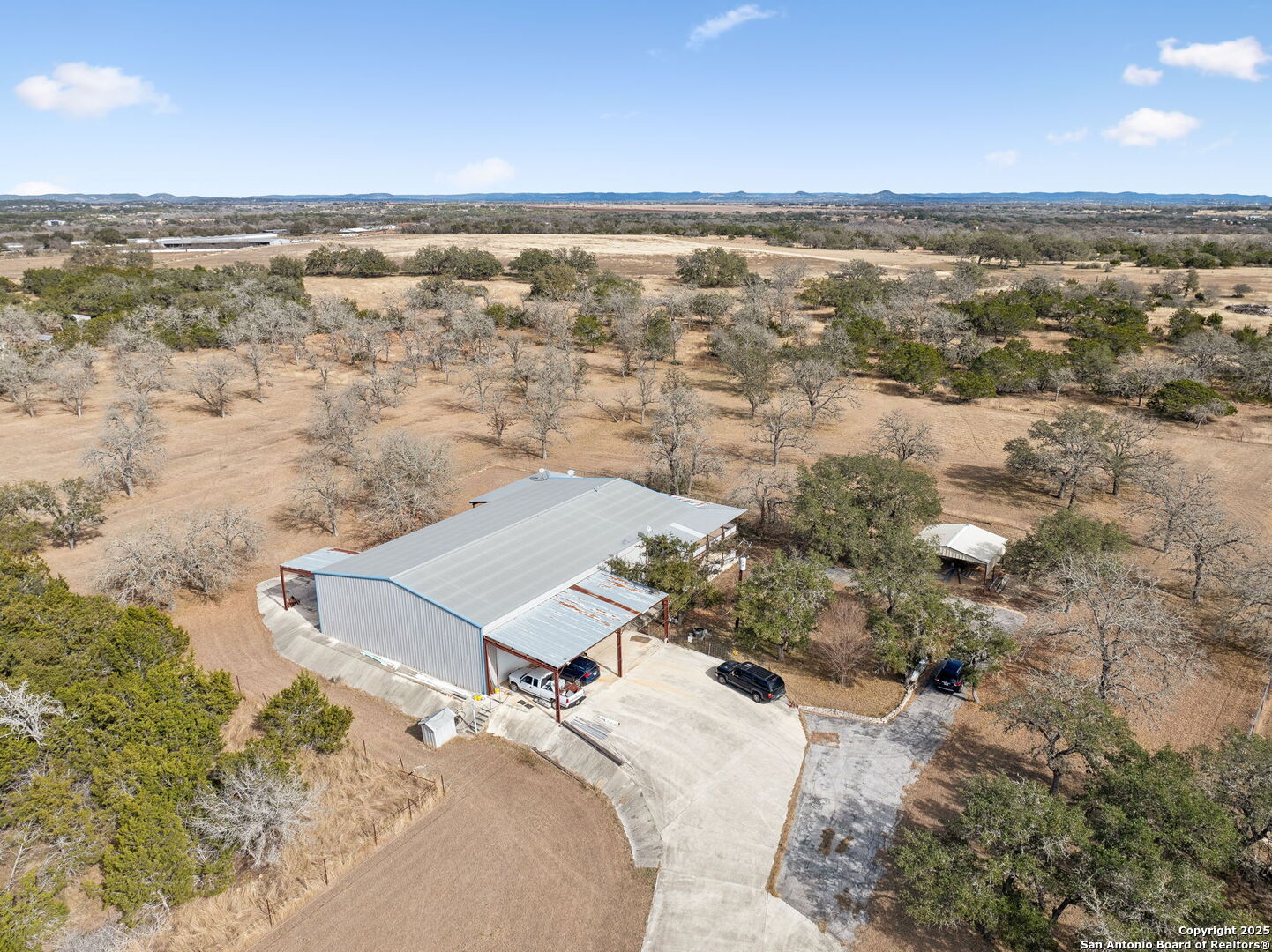 200 Highland Drive Bandera, TX 78003 - Photo 46 of 46 an aerial view of residential building with ocean view