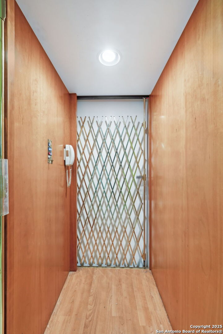 200 Highland Drive Bandera, TX 78003 - Photo 6 of 46 a view of wooden floor and in a kitchen