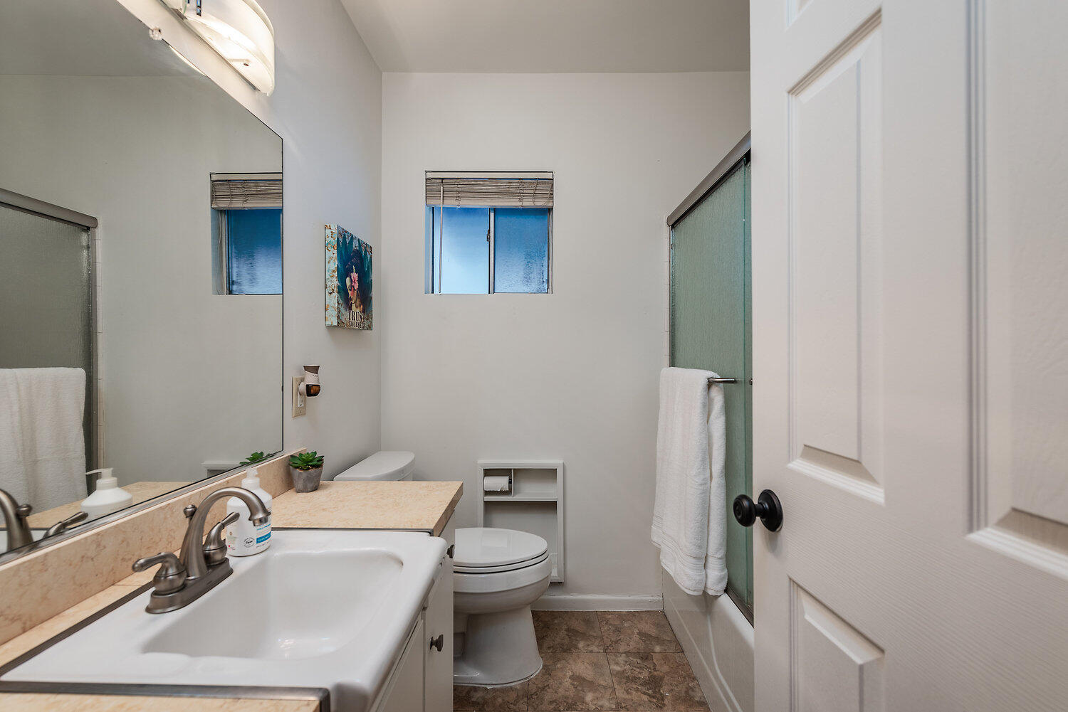 74111 Setting Sun Trail Palm Desert, CA 92260 - Photo 22 of 30 a bathroom with a sink toilet and mirror