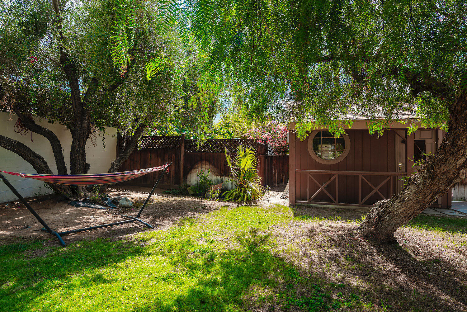 74111 Setting Sun Trail Palm Desert, CA 92260 - Photo 29 of 30 a backyard of a house with barbeque oven