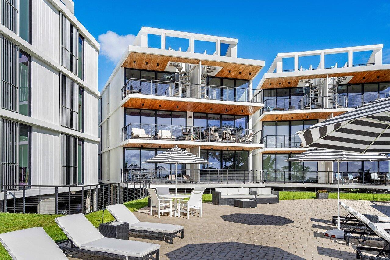 a view of houses with a swimming pool