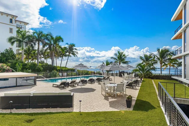 a view of a swimming pool with a patio