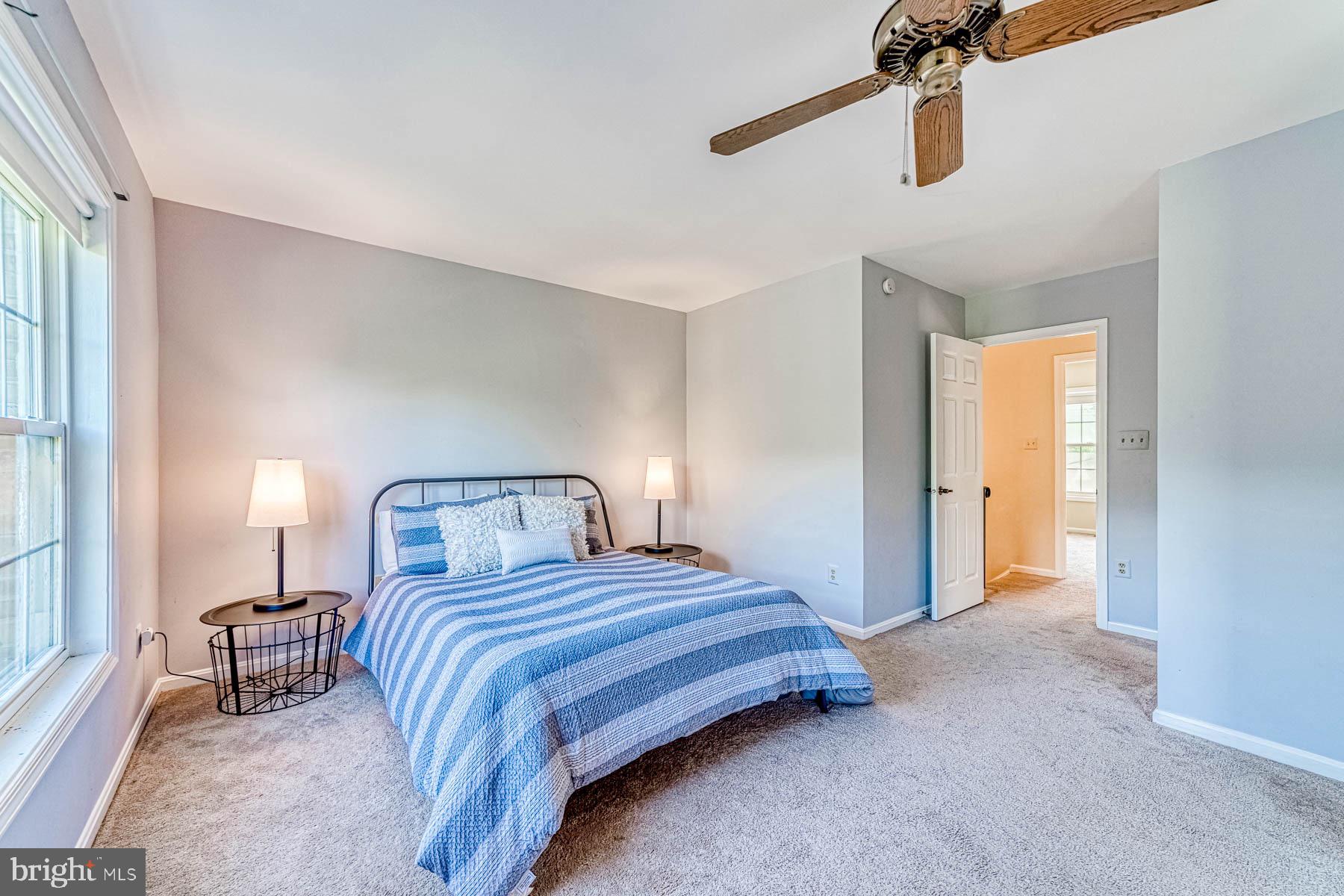 6657 Summer Grape Court Springfield, VA 22152 - Photo 16 of 40 Primary bedroom with seating area and ensuite bath