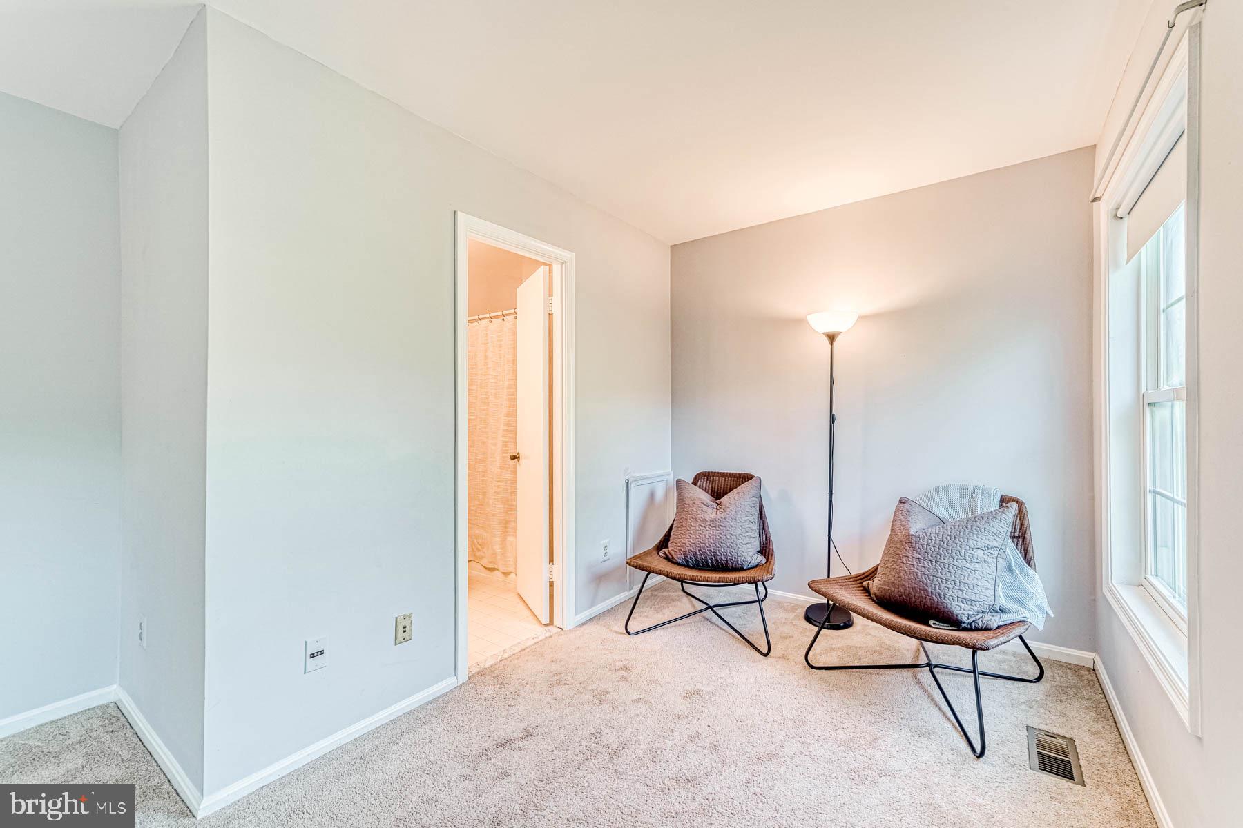 6657 Summer Grape Court Springfield, VA 22152 - Photo 18 of 40 Primary bedroom with seating area and ensuite bath