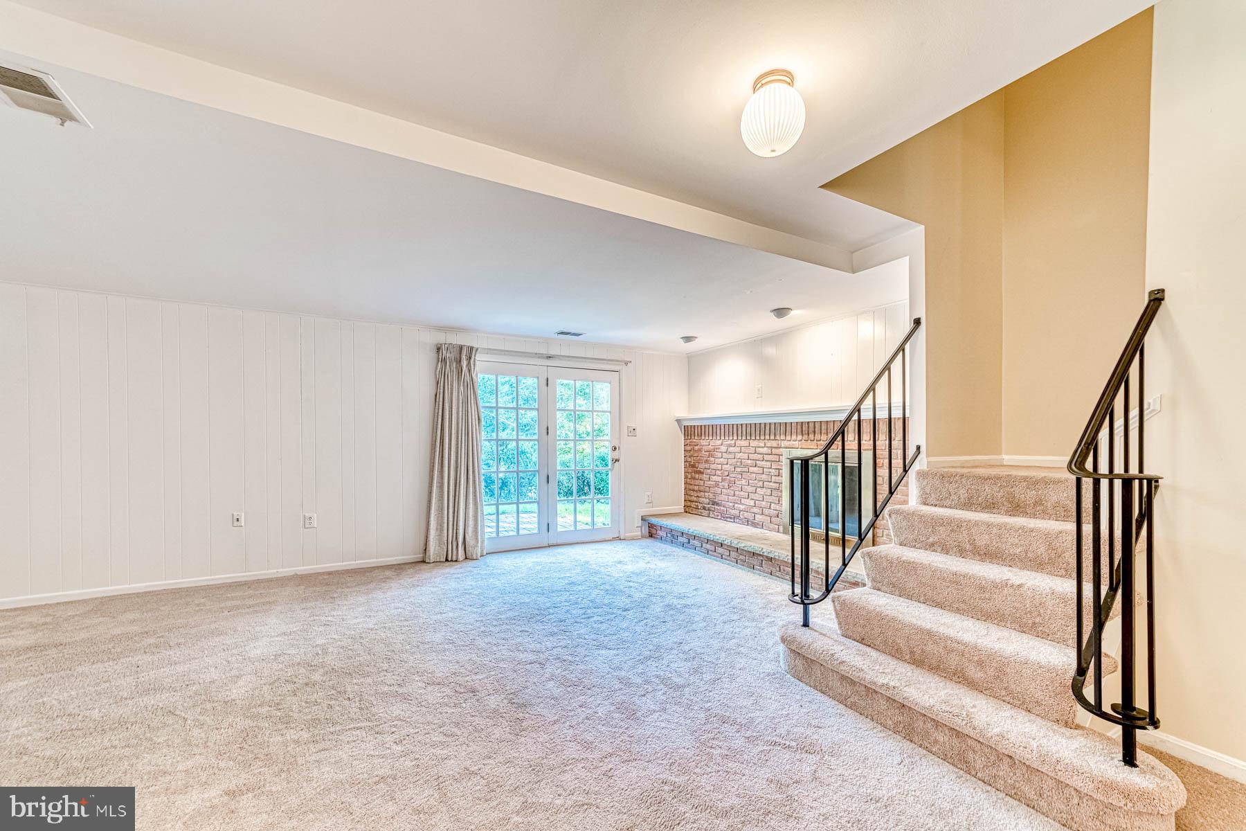 6657 Summer Grape Court Springfield, VA 22152 - Photo 26 of 40 Wood Burning Fireplace on Lower Level