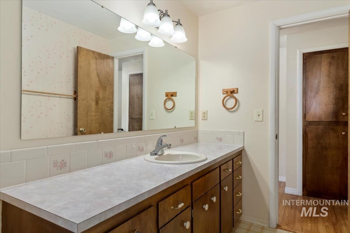 3850 Rugby Drive Boise, ID 83704 - Photo 21 of 44 Bathroom featuring vanity and light flooring